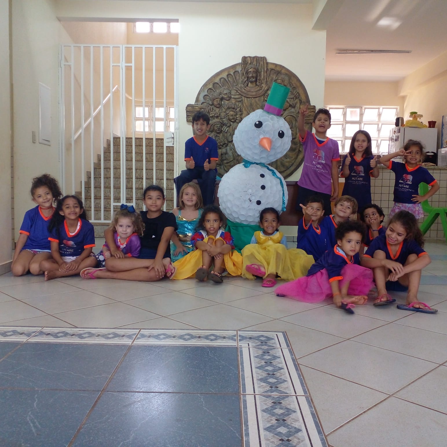 Detail of zipper pull with tan leather and silver rivet.