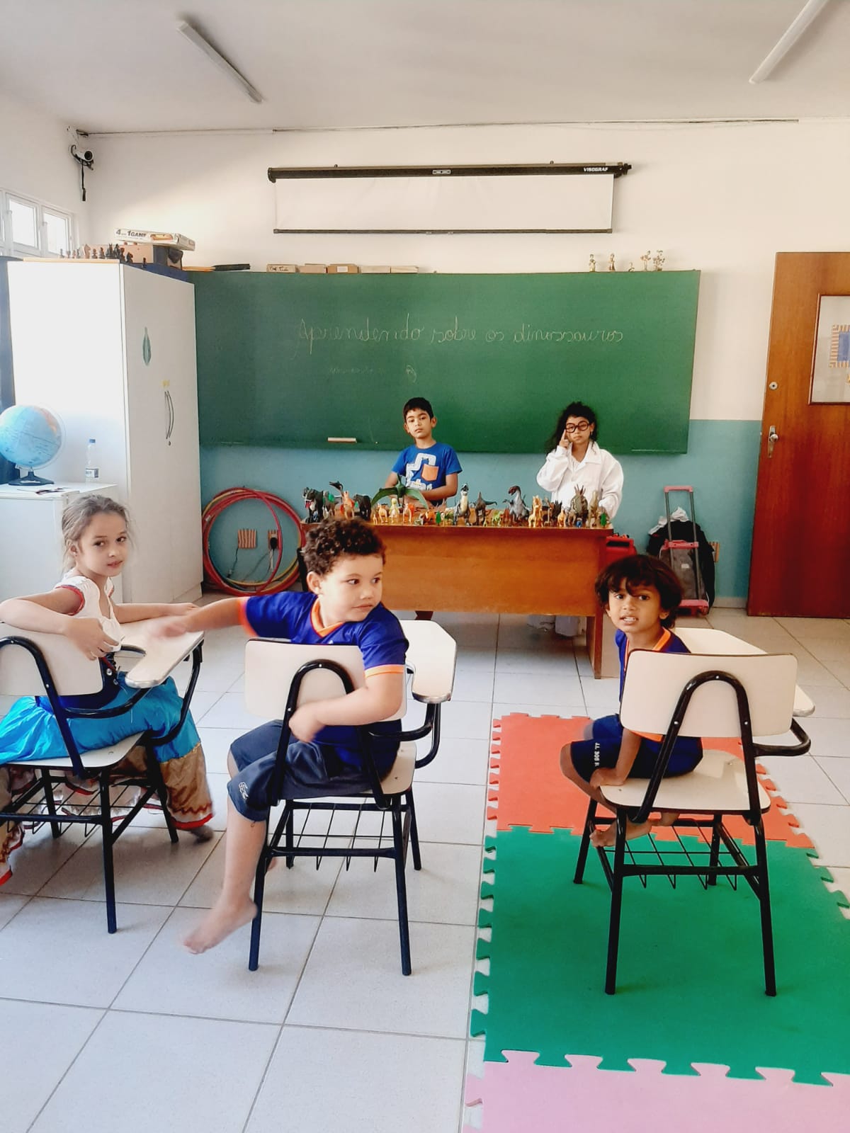 White canvas laptop sleeve with gray felt interior, silver zipper, and tan leather zipper pull.